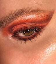 Load image into Gallery viewer, 1970&#39;s glamorous eye makeup in shades of red with brows brushed up
