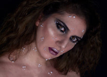 Load image into Gallery viewer, Beautantica wearing champagne Highlight and black smokey eye 
