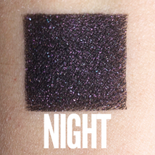 Load image into Gallery viewer, Black eyeshadow with purple shimmer editorial makeup 
