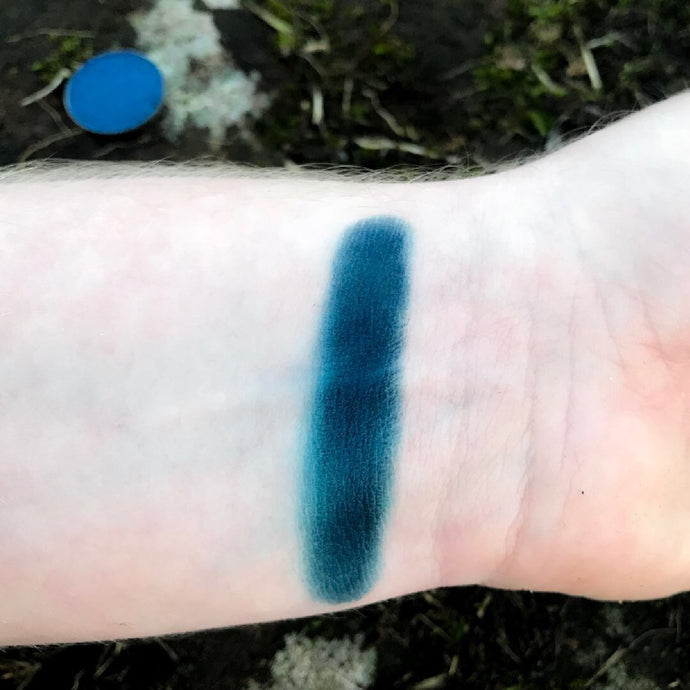Rich deep true matte navy blue swatched on pale arm stunning pigmentation 