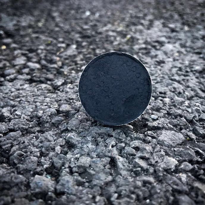Pigmented black shadow on a black road in Liverpool housed in a 26mm magnetic shadow eyeshadow pan 